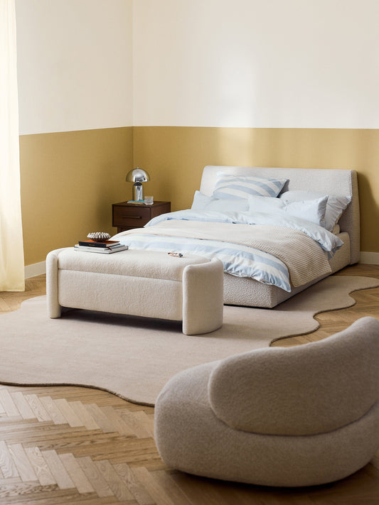 Clovinta Upholstered Bed in Bouclé