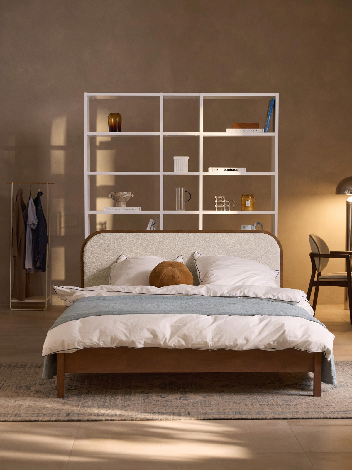 Jonsmark Wooden Bed with Bouclé Headboard