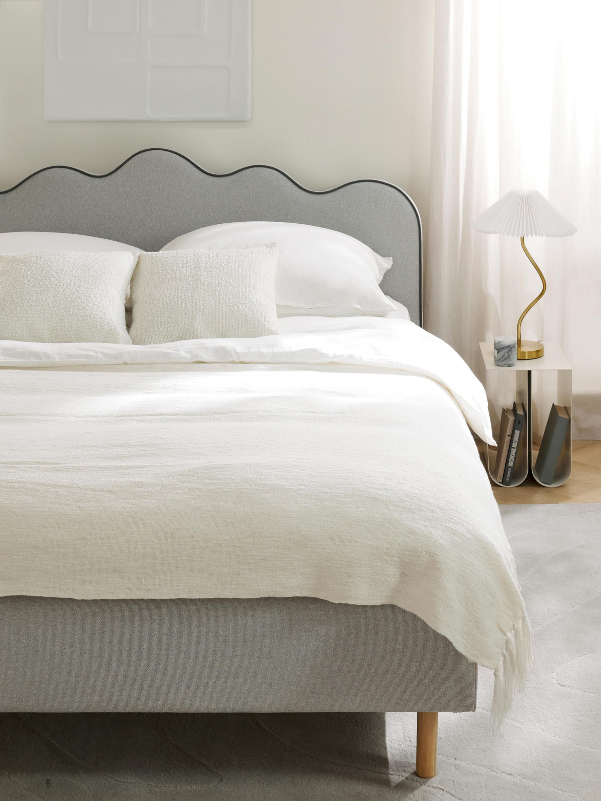 Rombiso Upholstered Bed with Wavy Headboard